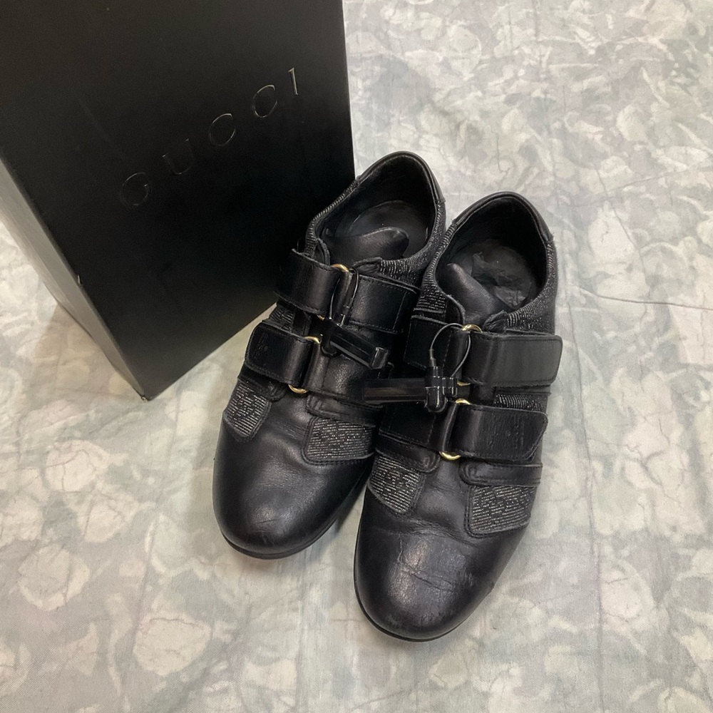 Gucci Black Leather Woman’s Strap Sneakers